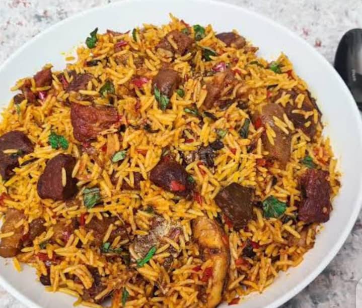 Bwari Kitchen signature party jollof rice with assorted meat